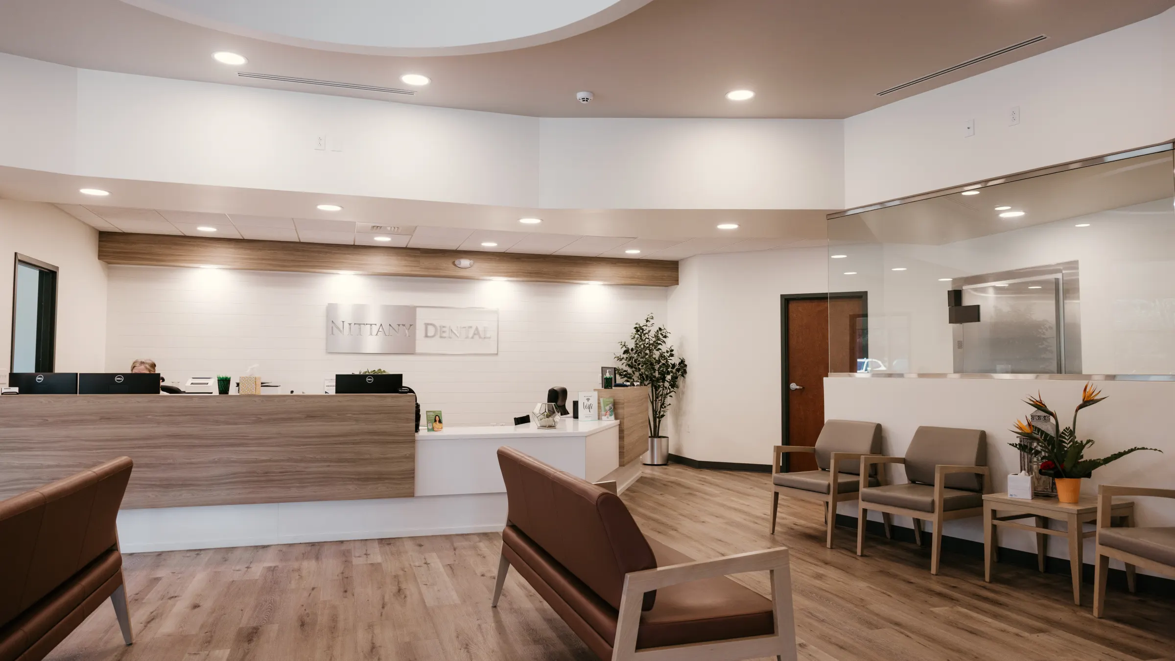 The front desk and waiting chairs